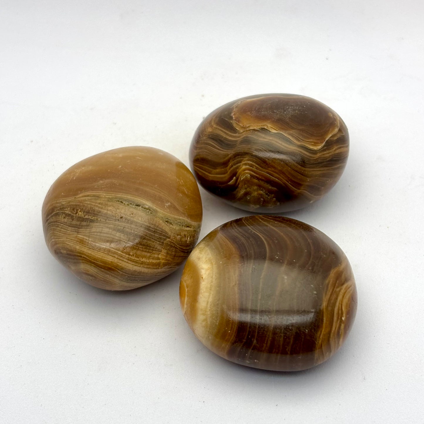 Chokolade calcit palmstones 4,5 cm Chokolade calcit palmstones 4,5 cm