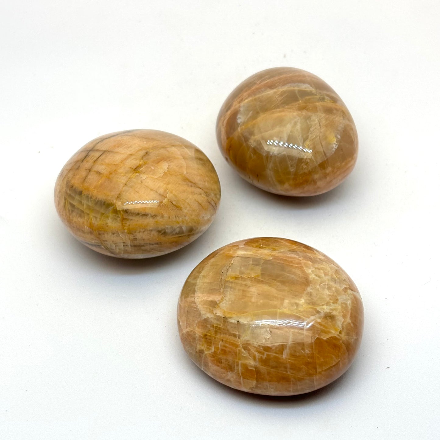 Salmon moonstone palmstone 5 cm Salmon moonstone palmstone 5 cm